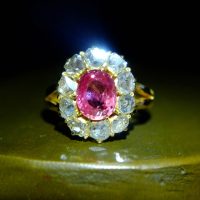 pink orange sapphire ring