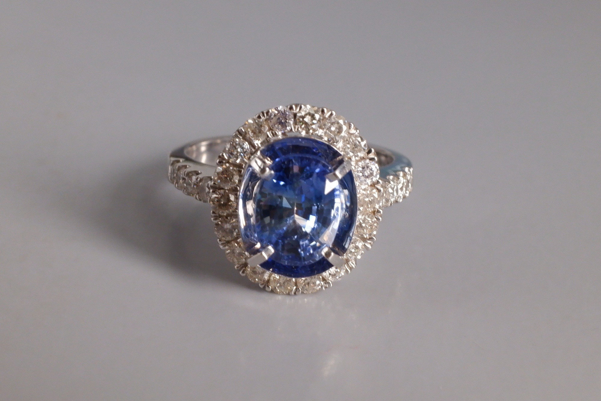 Oval Blue Sapphire Halo Ring 18k