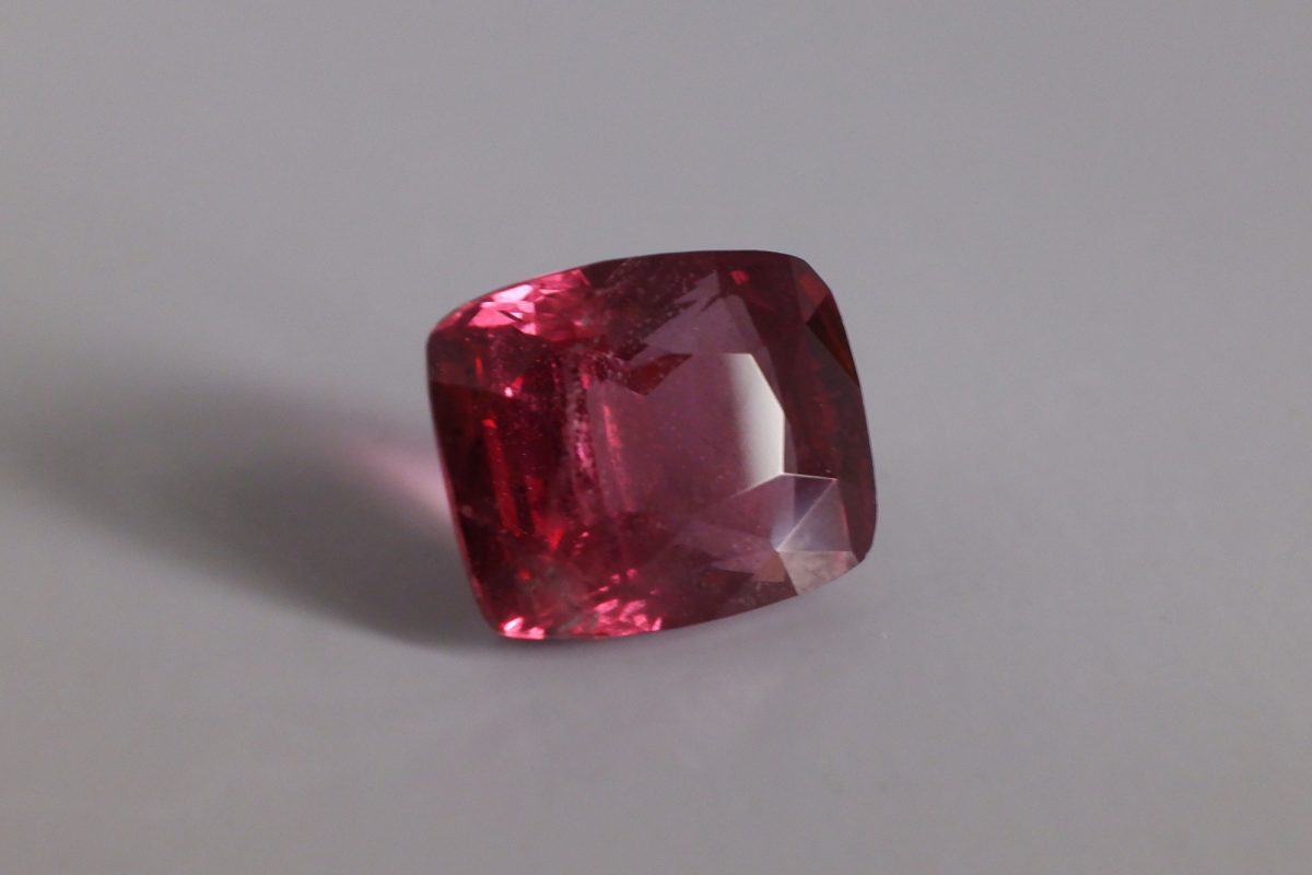 Reddish purple deals gemstone