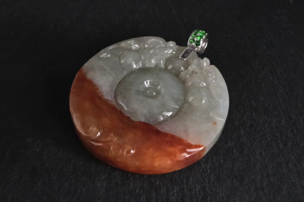 Carved jade on sale dragon pendant