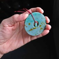 Green Gold Specks Jadeite Jade Donut Carving Amulet
