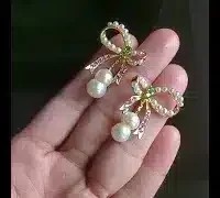 bow earrings yellow gold video