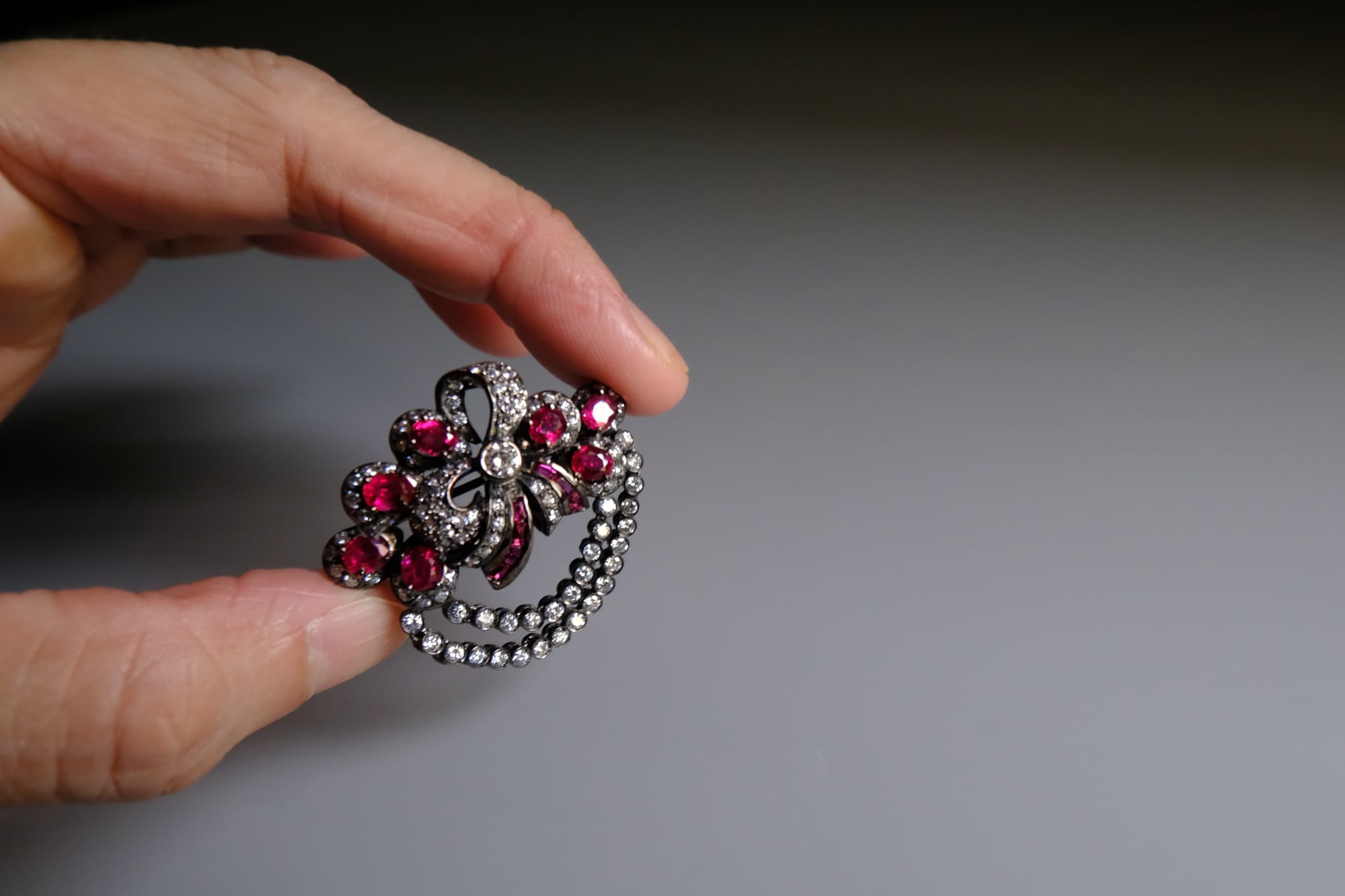 vintage ruby brooch pin, black and gold brooch pin, ruby bow brooch, ruby black gold, brooch pin singapore, antique gold ruby brooch, vintage ruby brooches for sale, fine jewelry brooches, Gem Gardener