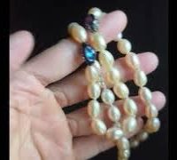 ellipsoid pearl necklace ruby sapphire diamond video