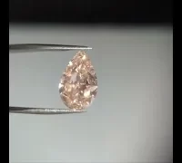 pear cut yellowish orange diamond natural light video