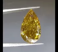 strong yellow fluorescence yellow diamond indoors video